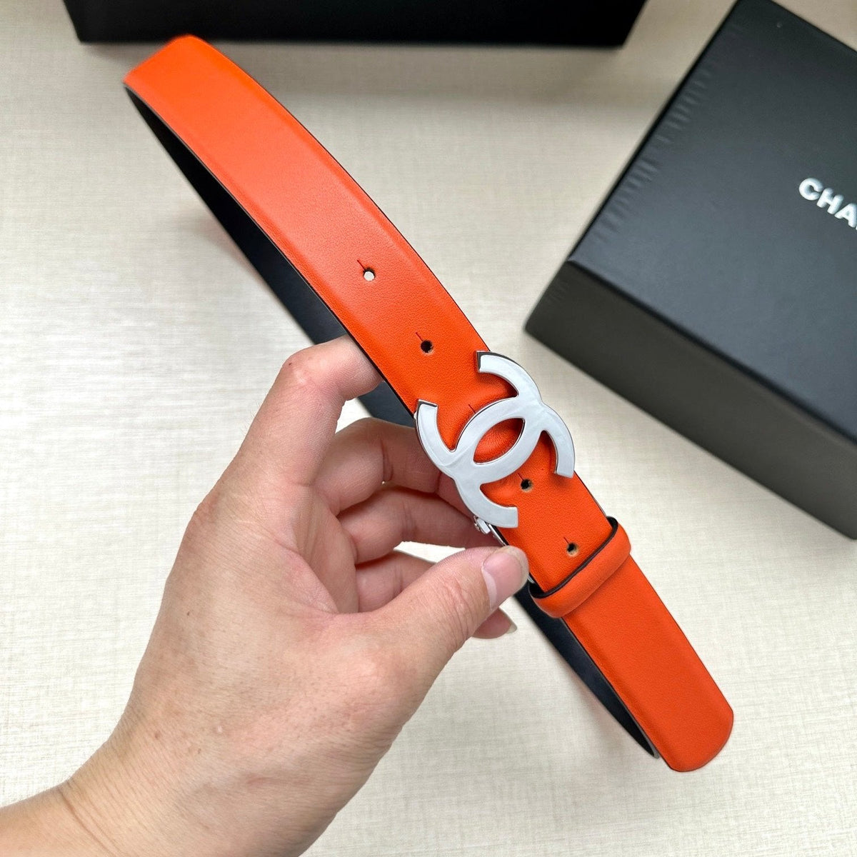 CC 30MM BELT IN FIRE ORANGE AND BLACK CALFSKIN WITH SILVER HARDWARE