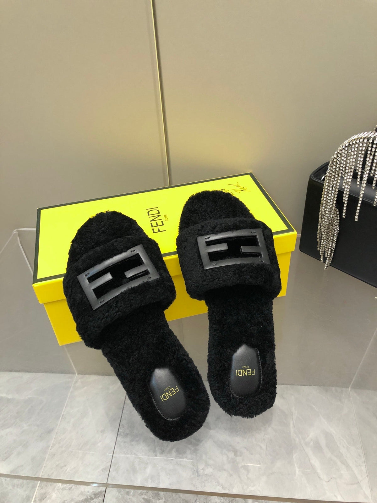 FENDI BAGUETTE SLIDE SLIPPERS IN BLACK WOOL