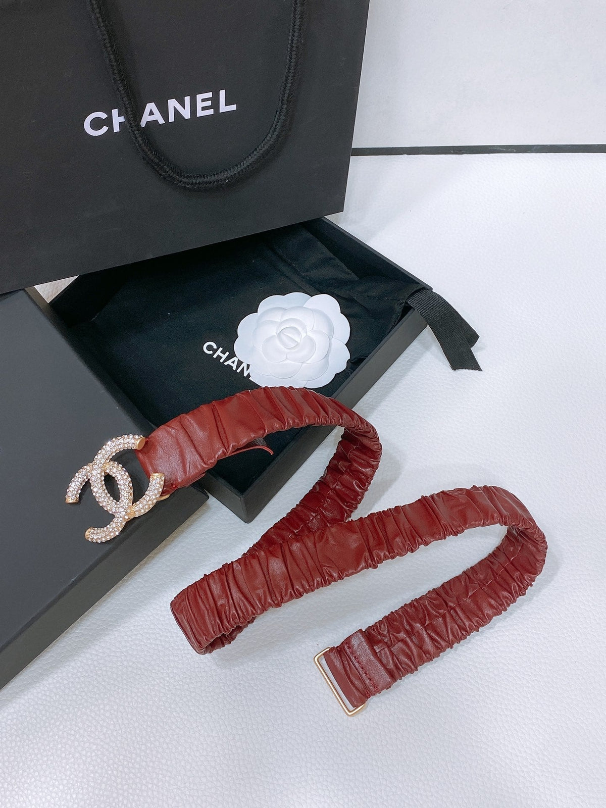 CC ELASTIC BELT 30MM IN WINE RED CALFSKIN GOLD HARDWARE WITH RHINSTONES