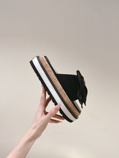 CC SLIPPERS WITH SILK BOW IN BLACK COWHIDE