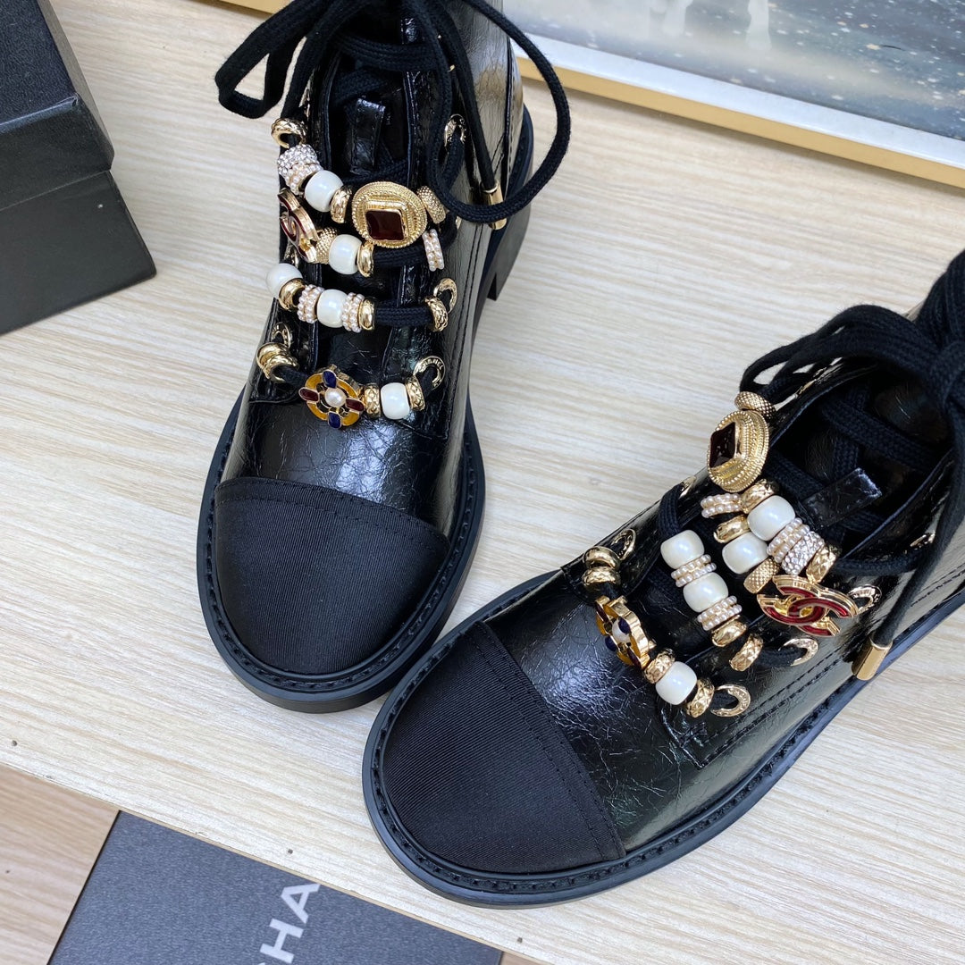 CC COMBAT BOOTS IN BLACK WRINKLED CALFSKIN AND GROSGRAIN WITH FAUX PEARL