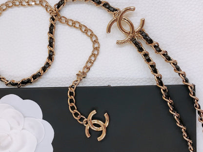 CHAIN BELT IN GOLD METAL INTERWOVEN WITH CALFSKIN STRAPS